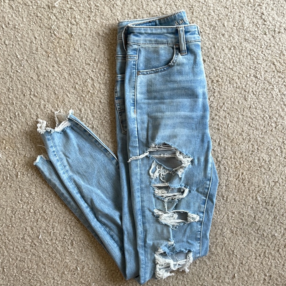 American eagle skinny, high rise jeans w/ holes, size 2 regular length
